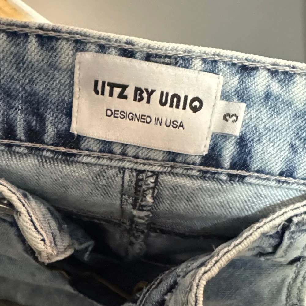 Distressed Light Blue Jeans - Picture 3 of 3